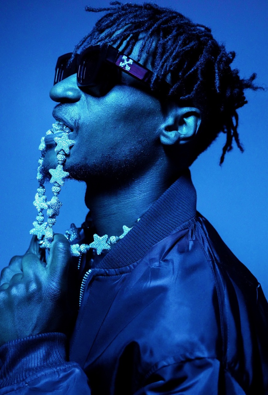 Star-chains and grills — the visual language of 'Party in My Room.'